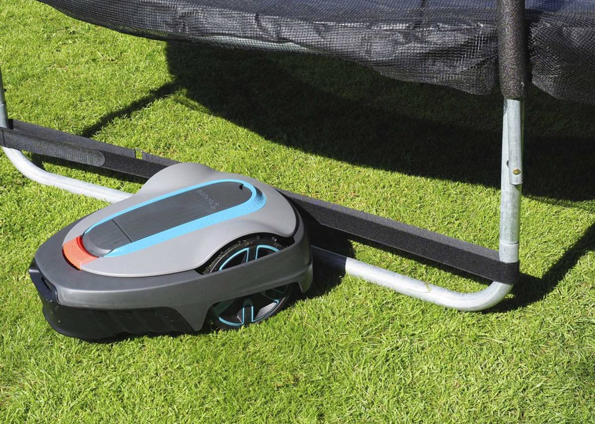 Secure mower shield attached to trampoline legs with Robostop technology.